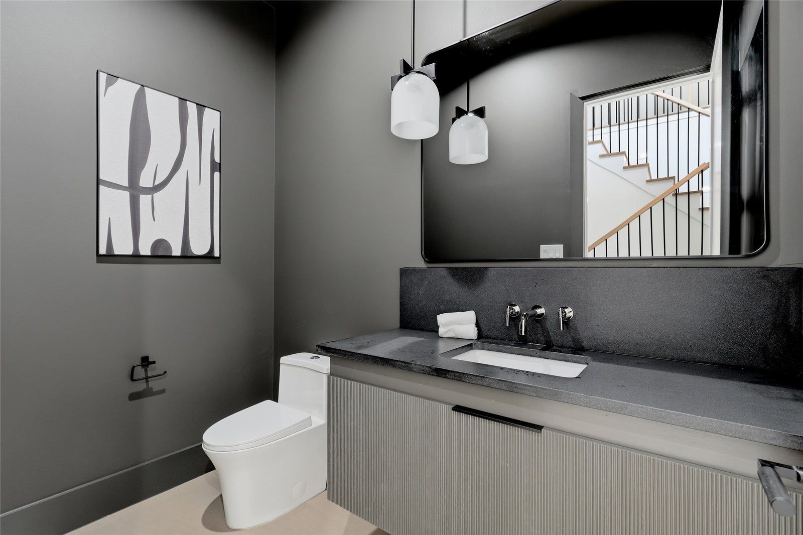 Dark stone powder room detail