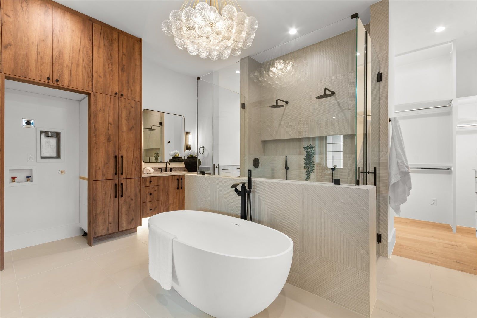 Sculptural freestanding tub, concealed systems