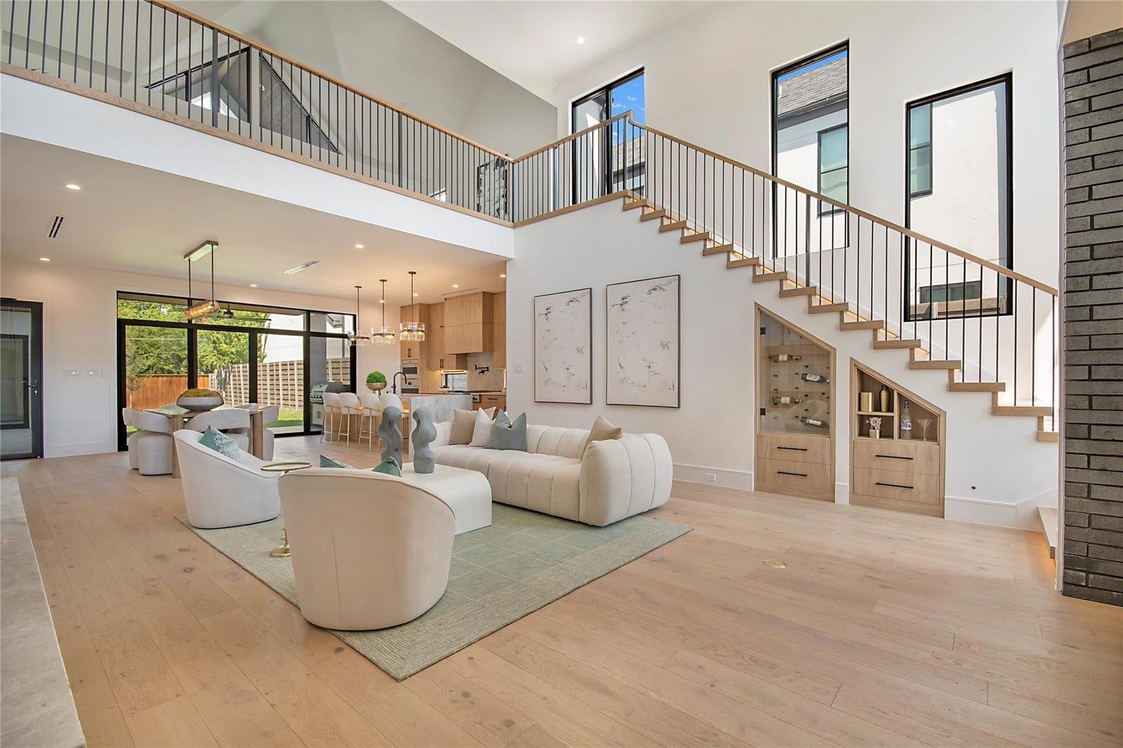 Open double-height living space washed in natural light